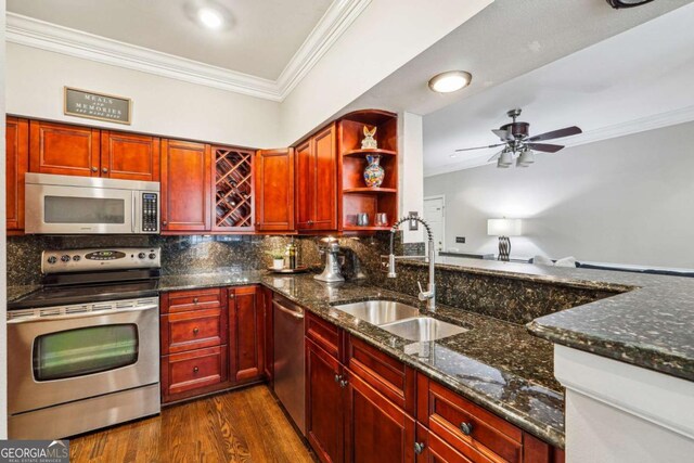 3777 Peachtree Rd NE Unit 911, Atlanta, GA 30319 - kitchen featuring stainless steel appliances, dark stone counters, a sink, and open shelves