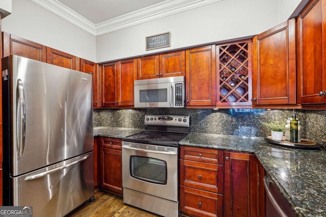 3777 Peachtree Rd NE Unit 911, Atlanta, GA 30319 - kitchen with backsplash, ornamental molding, stainless steel appliances, and dark stone countertops