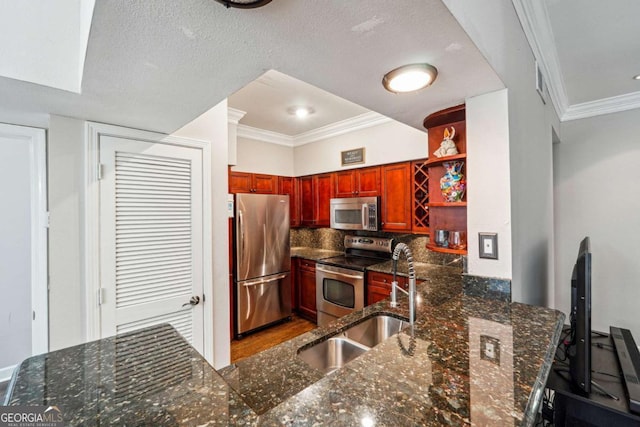 3777 Peachtree Rd NE Unit 911, Atlanta, GA 30319 - kitchen with stainless steel appliances, a peninsula, ornamental molding, dark stone counters, and open shelves