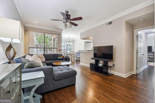 3777 Peachtree Rd NE Unit 911, Atlanta, GA 30319 - living area featuring baseboards, visible vents, dark wood-style flooring, crown molding, and ceiling fan with notable chandelier