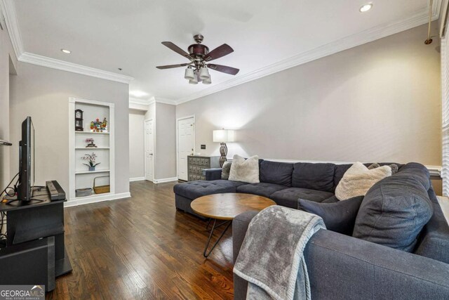 3777 Peachtree Rd NE Unit 911, Atlanta, GA 30319 - living area with baseboards, a ceiling fan, ornamental molding, dark wood-type flooring, and built in shelves
