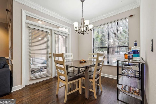 3777 Peachtree Rd NE Unit 911, Atlanta, GA 30319 - dining room featuring dark wood-type flooring, a healthy amount of sunlight, and crown molding
