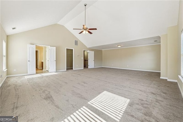 unfurnished living room with baseboards, a ceiling fan, carpet flooring, and visible vents
