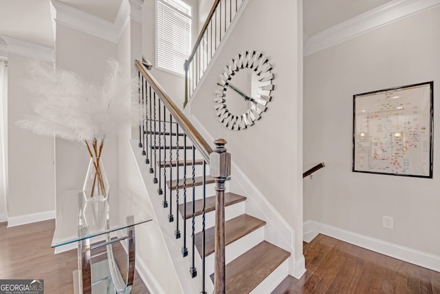 6441 SE Brookside Blvd, Mableton, GA 30126 - stairs with crown molding, baseboards, and wood finished floors