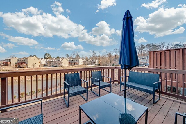 6441 SE Brookside Blvd, Mableton, GA 30126 - wooden terrace featuring an outdoor hangout area and a residential view