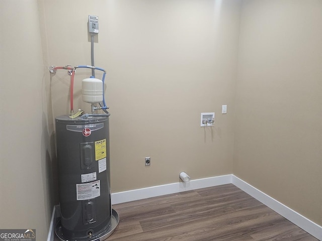 utility room with electric water heater