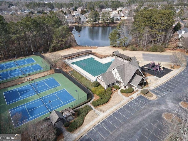 birds eye view of property featuring a water view