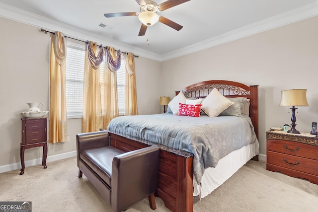 bedroom featuring baseboards, visible vents, light colored carpet, ceiling fan, and crown molding