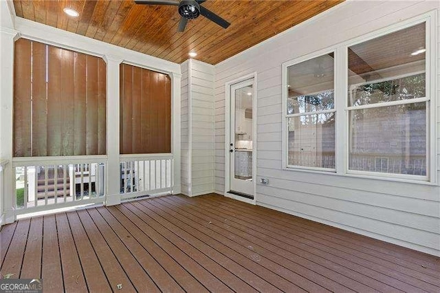 wooden terrace with ceiling fan