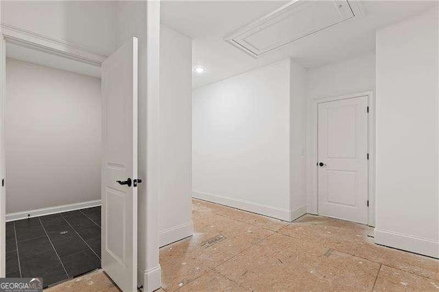 bathroom with baseboards