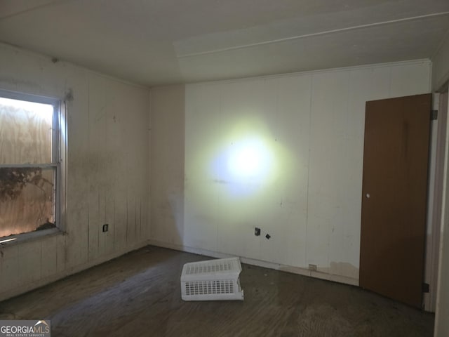 unfurnished room featuring dark wood-type flooring