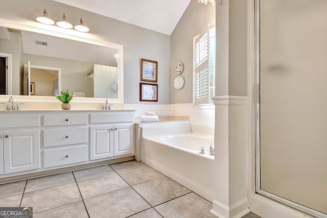 bathroom featuring tile patterned flooring, a sink, visible vents, a shower stall, and a bath