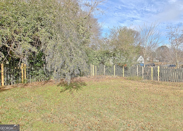 view of yard with fence