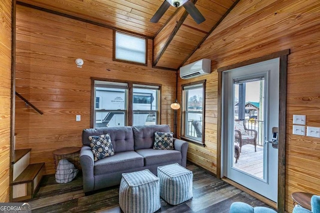 living area with vaulted ceiling, wood walls, a wall mounted AC, and dark wood finished floors