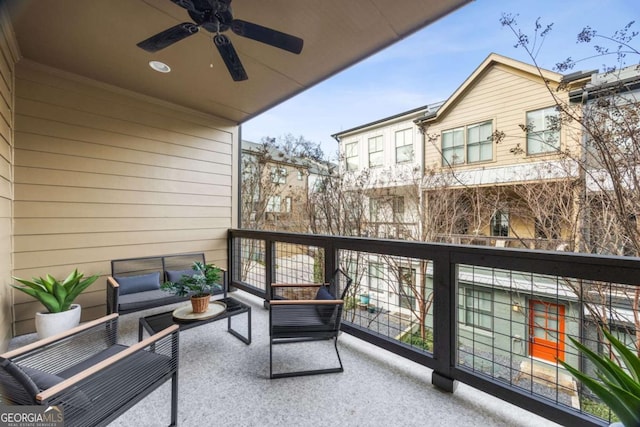 balcony featuring an outdoor hangout area and ceiling fan
