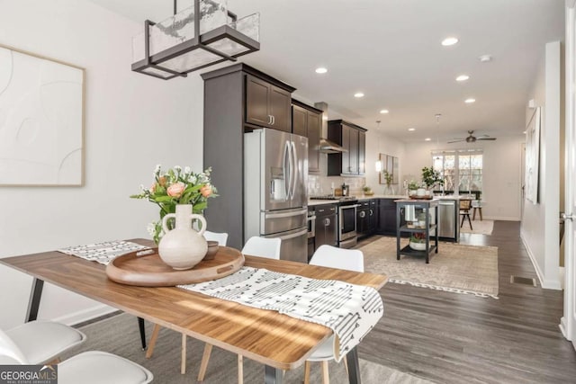 dining area with ceiling fan, light wood-style flooring, visible vents, recessed lighting, and baseboards