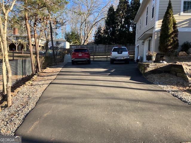 view of street featuring driveway