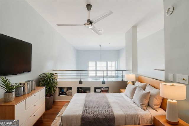 1253 Caroline St NE Unit 223, Atlanta, GA 30307 - bedroom with wood finished floors, a ceiling fan, and lofted ceiling