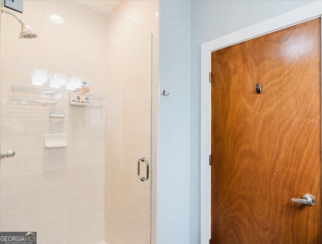 full bathroom with a shower stall
