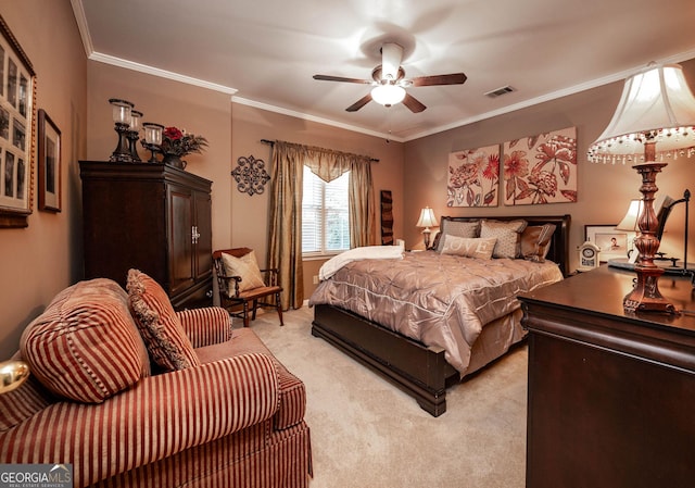 bedroom featuring light carpet, ceiling fan, ornamental molding, and visible vents