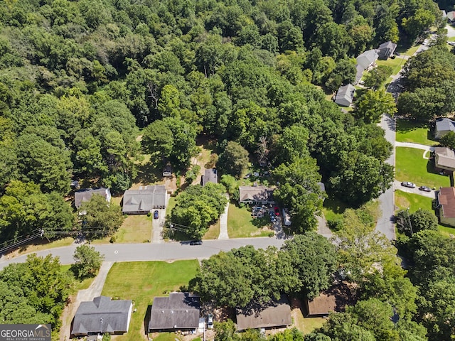 bird's eye view with a residential view and a wooded view