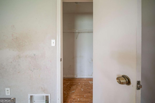 closet featuring visible vents