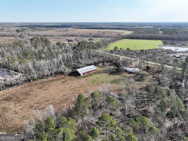 birds eye view of property featuring a rural view