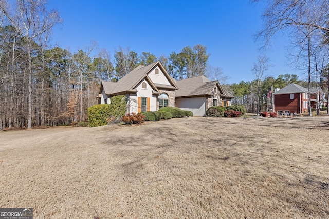 view of front of property with a front lawn