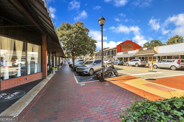 view of home's community with uncovered parking