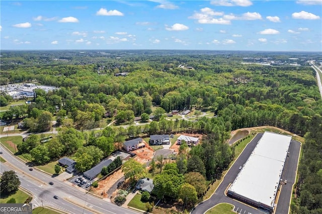 drone / aerial view of a heavily wooded area