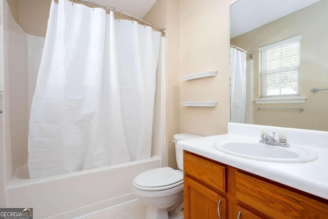 full bathroom featuring shower / bath combination with curtain, vanity, and toilet