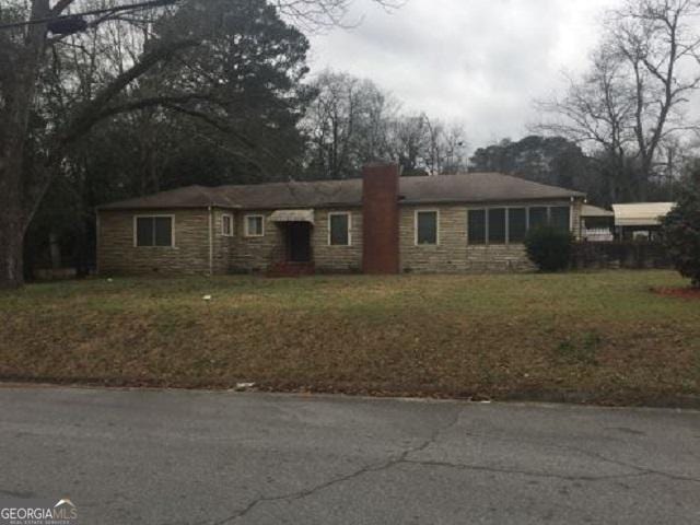 1531-1535 Colonial Dr, Macon, GA 31204 - ranch-style home featuring a front yard and stone siding