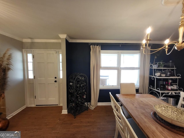 foyer featuring baseboards, dark wood finished floors, and crown molding