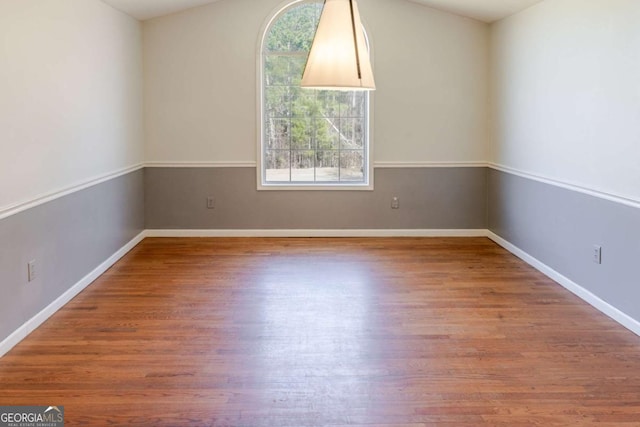 1004 Hamilton Dr, Locust Grove, GA 30248 - empty room with baseboards and wood finished floors