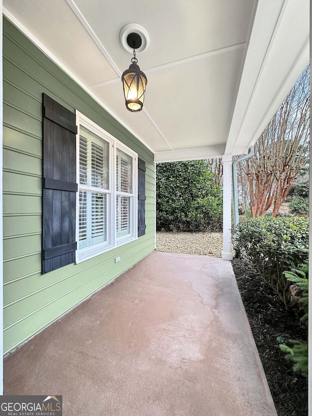 view of patio featuring a porch