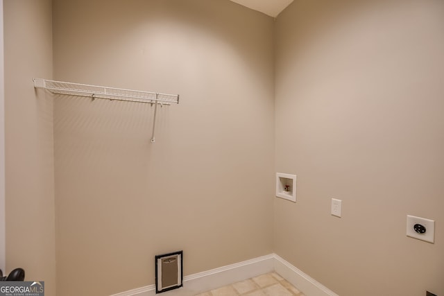 laundry room with laundry area, washer hookup, electric dryer hookup, and baseboards