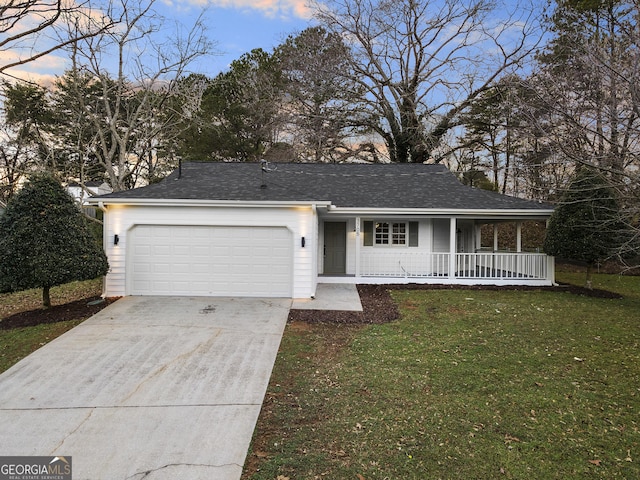 ranch-style house featuring a shingled roof, concrete driveway, an attached garage, covered porch, and a front yard