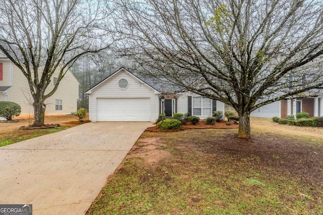 single story home with an attached garage and concrete driveway