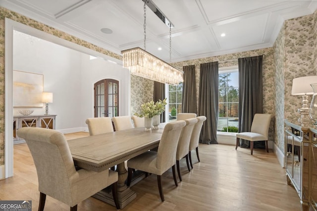 dining space with wallpapered walls, coffered ceiling, light wood-style floors, and french doors