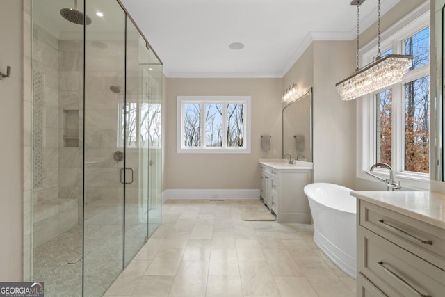 bathroom featuring a soaking tub, ornamental molding, a stall shower, vanity, and baseboards