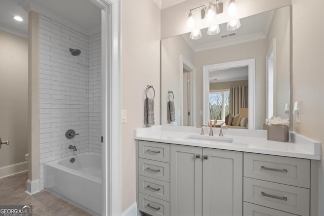 full bath featuring baseboards, visible vents, connected bathroom, ornamental molding, and tub / shower combination