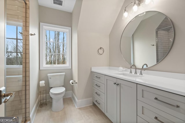 bathroom with visible vents, plenty of natural light, vanity, and toilet