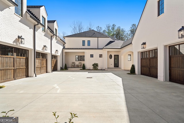 exterior space with concrete driveway