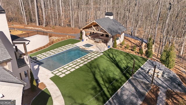 pool with a gazebo, a patio area, and fence private yard