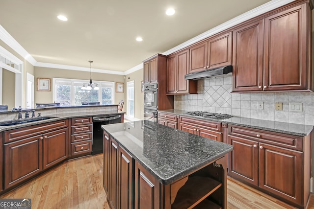 kitchen with a kitchen island, under cabinet range hood, black appliances, open shelves, and a sink