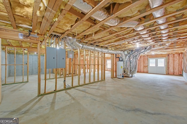 basement with electric panel and water heater