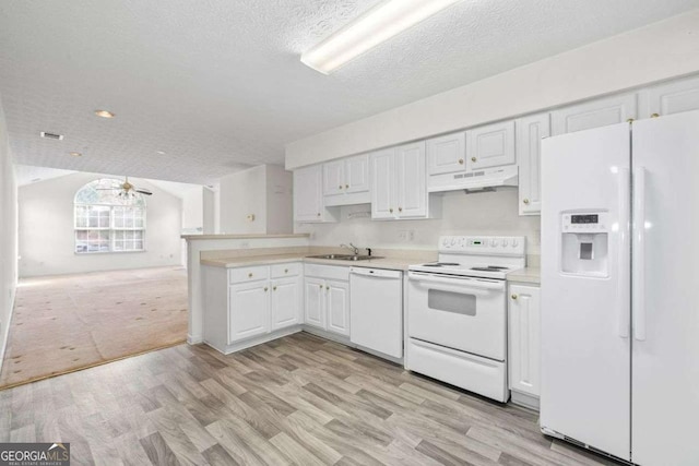 kitchen featuring light countertops, open floor plan, white cabinets, white appliances, and under cabinet range hood