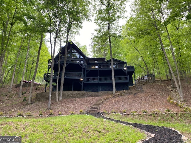 rear view of house with a deck