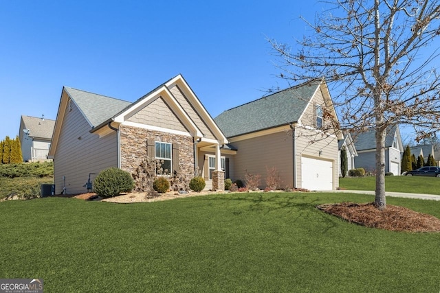 craftsman-style home featuring an attached garage, stone siding, central AC unit, and a front yard