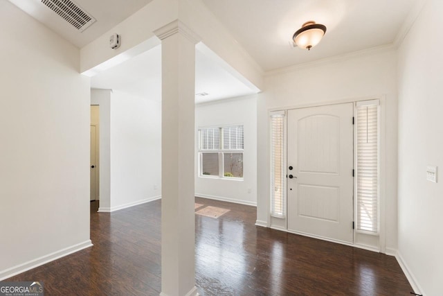 entryway with baseboards, decorative columns, visible vents, and dark wood-style flooring